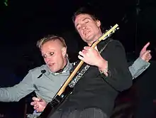 Davies (right) performing with Keith Flint