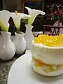 Lemon mousse with peach compote