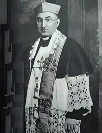 A portrait of Bishop Hodur, wearing a Biretta, taken in 1923.