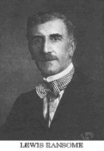 Head shot of a middle-aged man with moustache and bow tie.