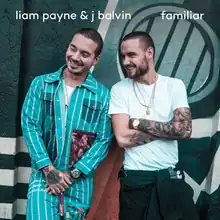 Liam Payne and J Balvin standing in front of a graffitied wall