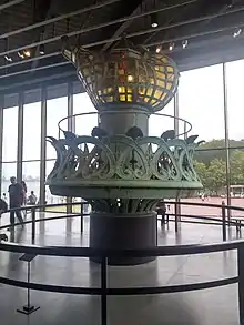 The original 1886–1984 torch of the Statue of Liberty (Liberty Enlightening the World) is housed in the Statue of Liberty Museum on Liberty Island, New York City