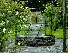 The Fresnel lens from Islay now makes a focal point in the old kitchen gardens at Colonsay House Gardens