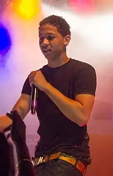 Bibby performing in 2014