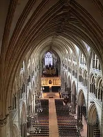 Nave of Lincoln Cathedral (begun 1185) showing three levels; arcade (bottom); tribune (middle) and clerestory (top)