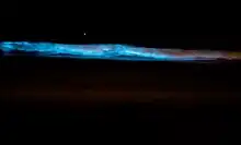 Surf glowing blue in Southern California