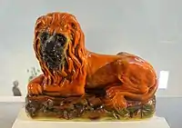 Lion, glass eyes, spray decoration, 1890-1900.