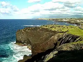 Oceanside limits of São Vicente Ferreira, showing the high cliffs and planar relief along the northern coast