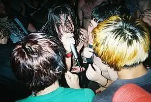 Chris Taylor performing with Pg. 99 in Reading, Pennsylvania, in 2002