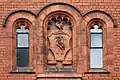 Terracotta coat of arms of the City of Liverpool, Victoria Building, University of Liverpool, located on the second floor above the main entrance
