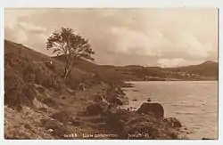 A 1920s postcard picture showing the route of the Pandora to Klondyke tramway along the shore of Llyn Geirionydd, before construction of the present road