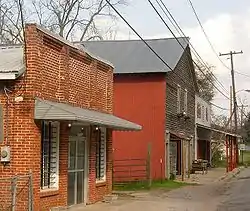 Loachapoka Town Hall (left) and Fred's Feed & Seed and Pickin’ Parlor (right)