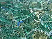 Large pile of lobster pots, Youghal, Ireland