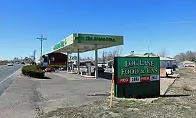 A gas station in Log Lane Village