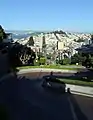 Looking east down the curvy block of Lombard Street, with the straight section continuing towards Telegraph Hill and Coit Tower