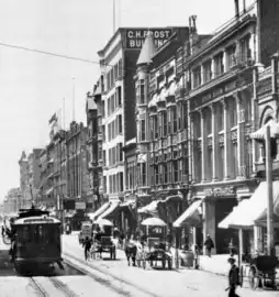 C.H. Frost Building at 145 S. Broadway, c.1904-5. To its right, the turreted Roanoke Bldg. (#137-9), Newell & Gammon Bldg. (#131-5), and the Mason Opera House (#125-9).