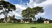 Lord Egerton Castle (left) with the first house (right) and second house (center)