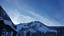 Snowy mountain with ski lodge