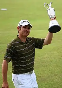 Louis Oosthuizen holding the Claret Jug, having won the 2010 Open