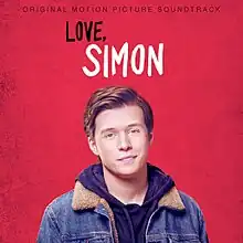 A photo of a young man, with the words, "Love, Simon"
