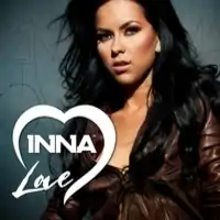 Shot of Inna wearing a brown jacket against a blue backdrop. Information on the song is superimposed on her.