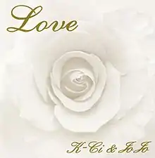 A faded-sepia-toned rose with "Love" written in gold script in the top left of the cover and "K-Ci & JoJo" in the bottom right.