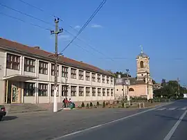 The high school and the Roman Catholic church in Lovrin