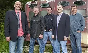 Shelor (left) in the Lonesome River Band, 2014