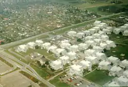 Aerial view of Hundige, with the large grey buildings of the Askerød housing project.
