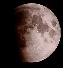 March 2007 lunar eclipse. The advancing shadow of Earth brings out detail on the lunar surface. The huge ray system emanating from Tycho is shown as the dominant feature on the southern hemisphere.