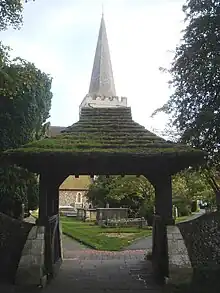 Early 20th-century lychgate at St Andrew's Church, West Tarring, West Sussex