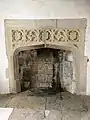 Decorated medieval fireplace