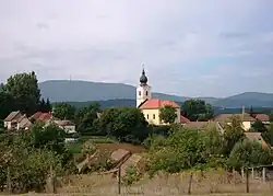 The catholic church of Mátraderecske and the Kékes
