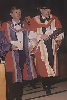 Ó Súilleabháin (left) at the honorary conferring of Seamus Heaney (right) at the University of Limerick, 1996