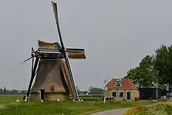 Eponymous windmill De Poelen near the hamlet