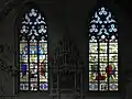 Glass windows in the northern side aisle, originally from the cloisters of Marienfeld Abbey.