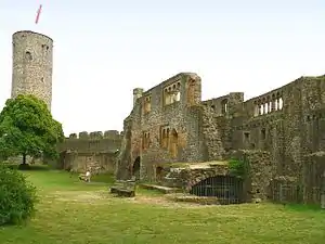 The ornate palace and tall narrow keep in the upper ward of Münzenberg Castle.