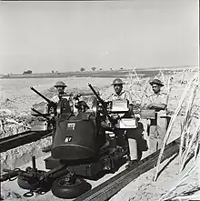 Pakistani soldiers operating a M45 Quadmount during the 1965 conflict with India