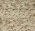 A 24.66 inches (626 mm)-wide fabric swatch of MARPAT desert pattern