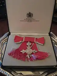 Badge as awarded to a female MBE