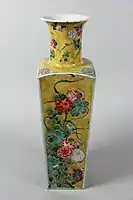 Famille jaune vase, probably Kangxi reign, Jingdezhen. Porcelain painted in polychrome enamels on the biscuit and on the glaze .