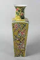Vase, Kangxi reign (1661–1722), painted with famille jaune enamels on the biscuit and on the glaze.