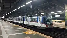 A four-car MRTC 3000 class train at Araneta Center-Cubao station in April 2022
