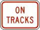 On tracks plaque