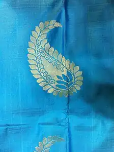 Modern silk sari with mankolam design, made in Kanchipuram