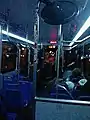 Inside a hybrid bus at night