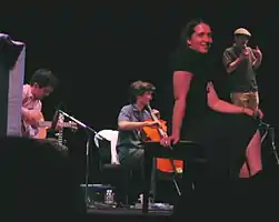 The Magnetic Fields in concert, 2004. From left to right: John Woo, Sam Davol, Claudia Gonson, Stephin Merritt.