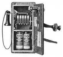 Image 641917 wall telephone, open to show magneto and local battery (from History of the telephone)