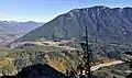 Mailbox Peak, seen from Salal Point. Washington State Fire Training Academy at the foot of the mountain. Interstate 90 in lower right. Moolock Mountain in the distance to left.