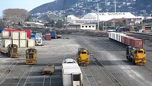 DFT 7295, DSGs 3236 and 3251 (all three in the Bumble-Bee livery), and DFB 7213 and DC 4542 (in the Cato Blue livery) in the Dunedin Rail Yard.